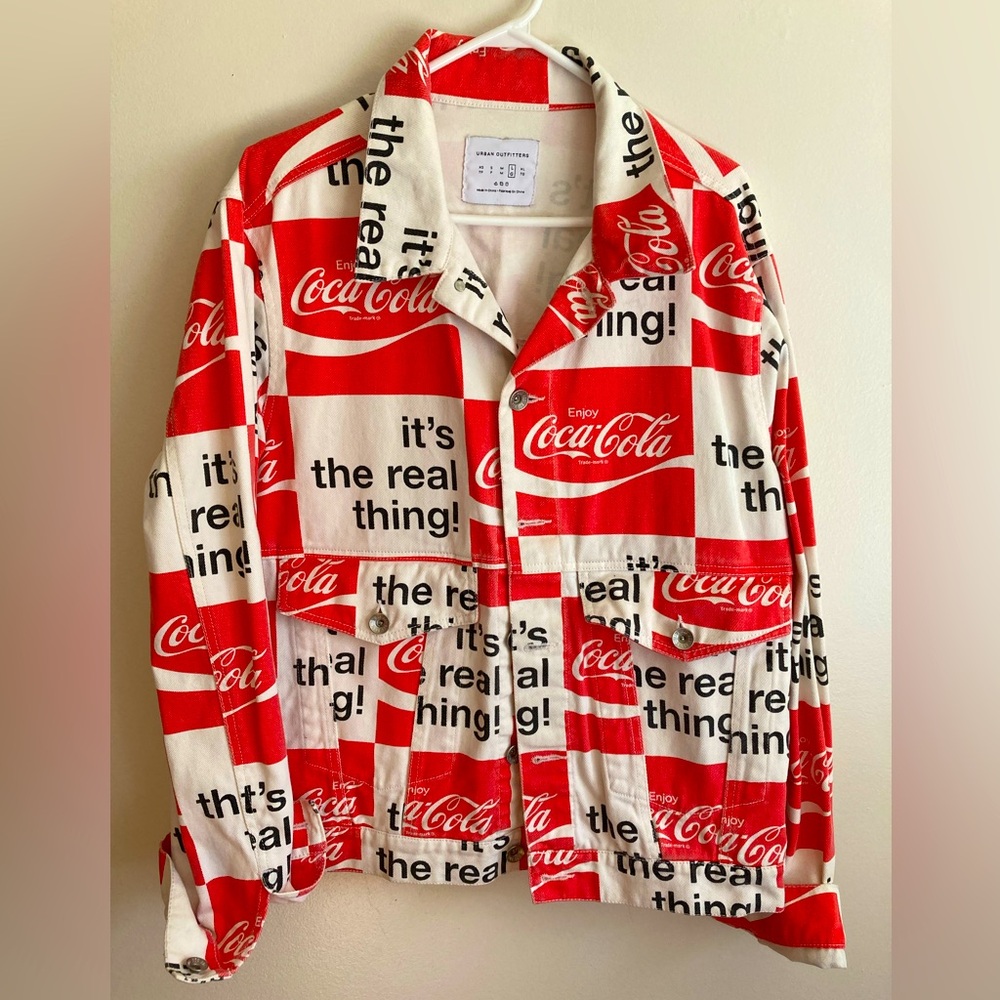 Urban Outfitters “Coca-Cola, It’s The Real Thing” All Over Print Jacket